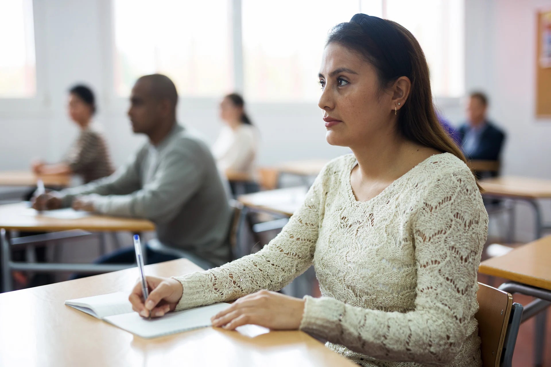 Adult learners taking part in a training session
