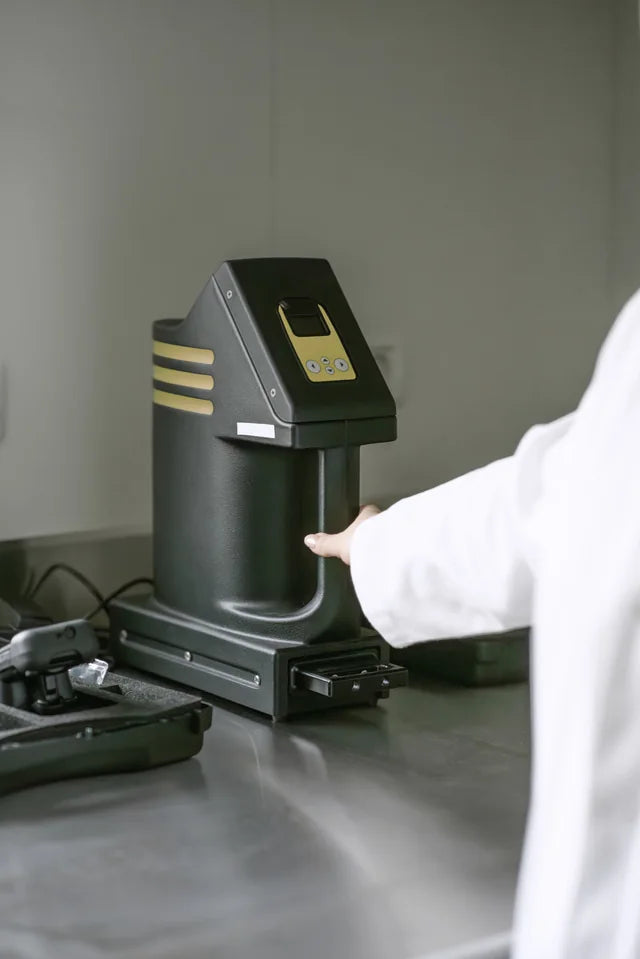 A laboratory worker testing a sample