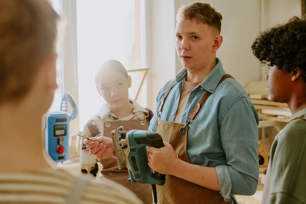 An instructor explaining a practical workshop activity